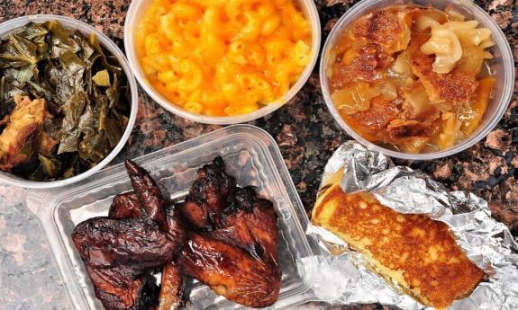 Collard greens, mac and cheese, fried cabbage and fried chicken wings