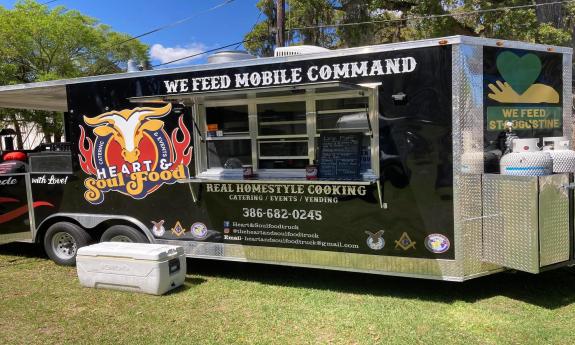 Heart and Soul Food Truck service window with chalkboard menu